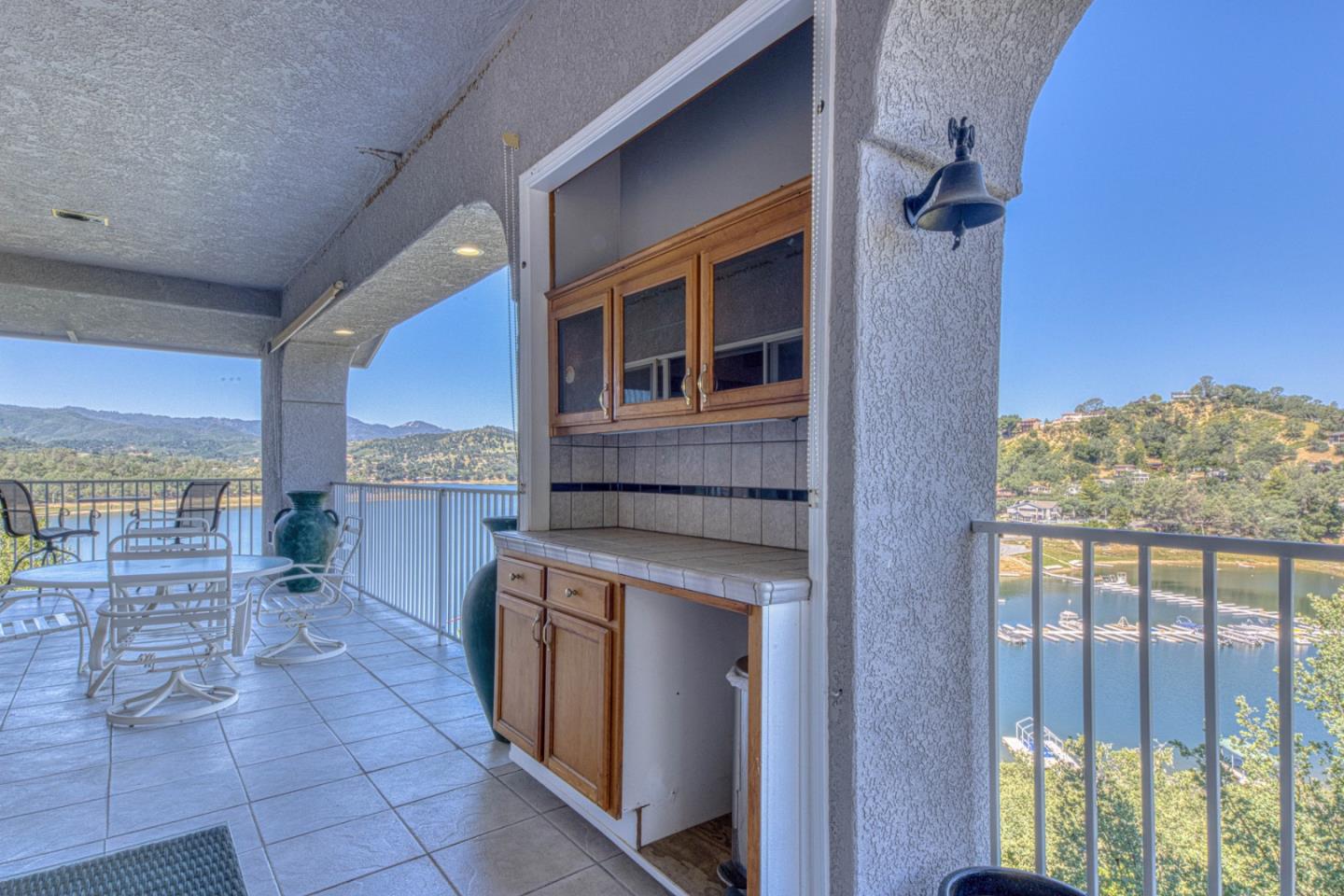 8213 Bass Point Road Bradley, CA 93426 - Photo 32 of 58 a kitchen with stainless steel appliances granite countertop a stove and a refrigerator