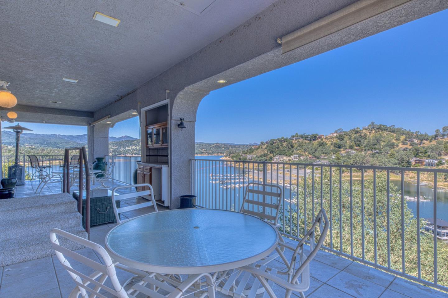 8213 Bass Point Road Bradley, CA 93426 - Photo 33 of 58 a dining room with furniture and a floor to ceiling window