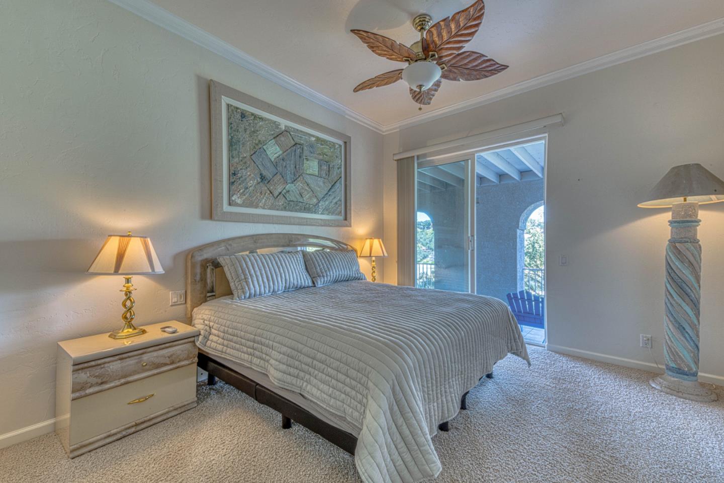 8213 Bass Point Road Bradley, CA 93426 - Photo 40 of 58 a bedroom with a bed and a chandelier