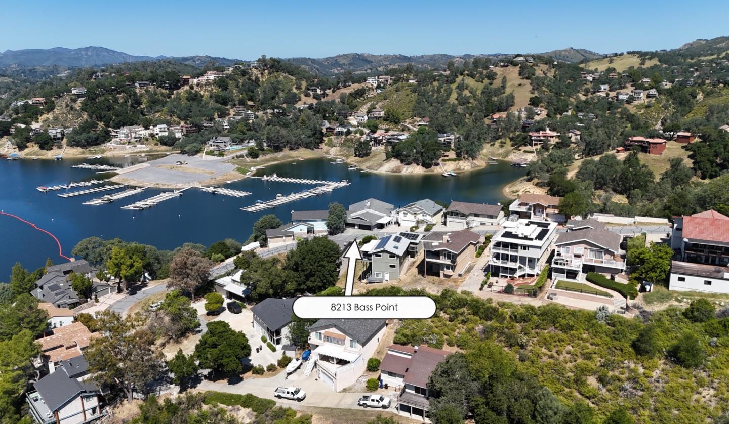 8213 Bass Point Road Bradley, CA 93426 - Photo 4 of 58 an aerial view of a house with a lake view
