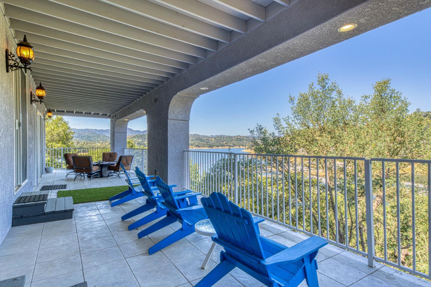 8213 Bass Point Road Bradley, CA 93426 - Photo 46 of 58 a view of a balcony with chairs and wooden fence