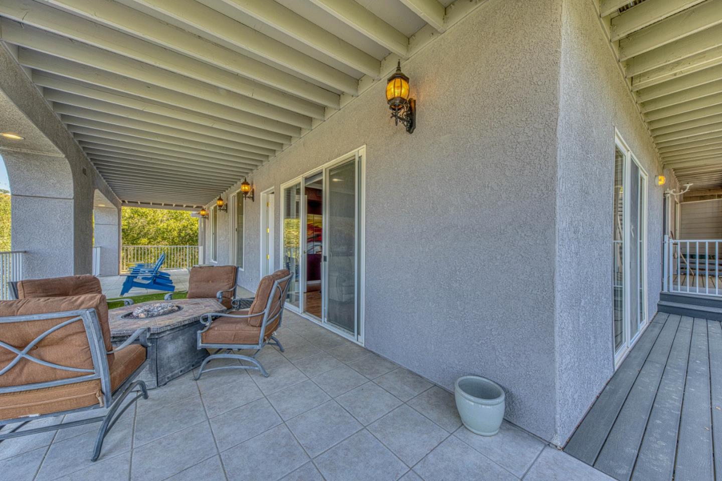 8213 Bass Point Road Bradley, CA 93426 - Photo 47 of 58 a outdoor space with patio furniture and wooden floor