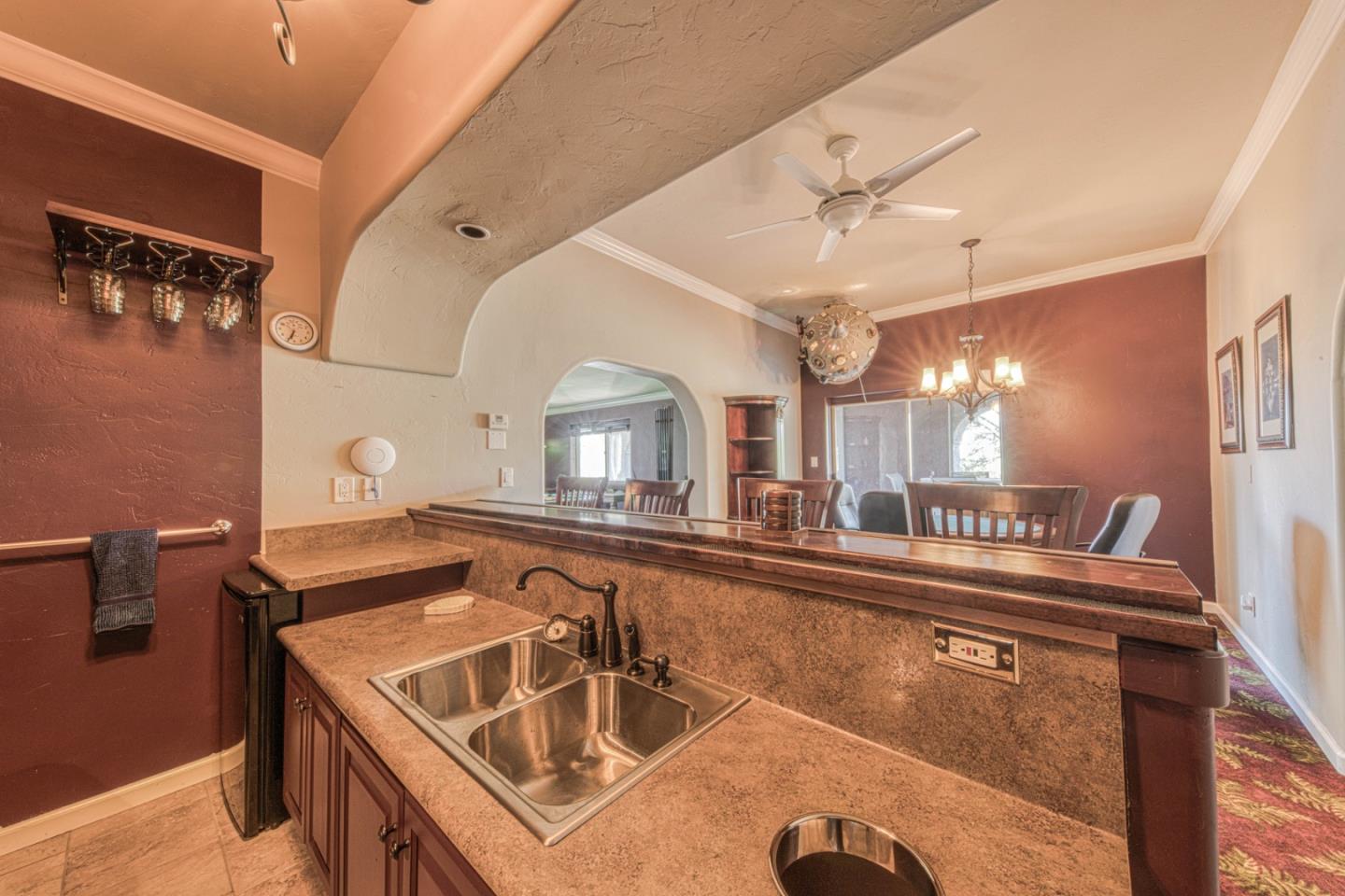 8213 Bass Point Road Bradley, CA 93426 - Photo 50 of 58 a kitchen with a sink a counter top space and a view of living room