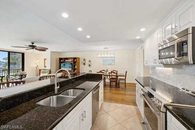 a view of swimming pool with a garden and stairs