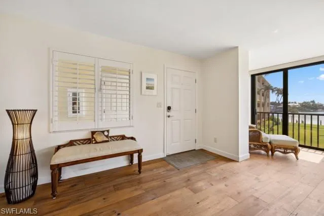a bedroom with a bed and dresser
