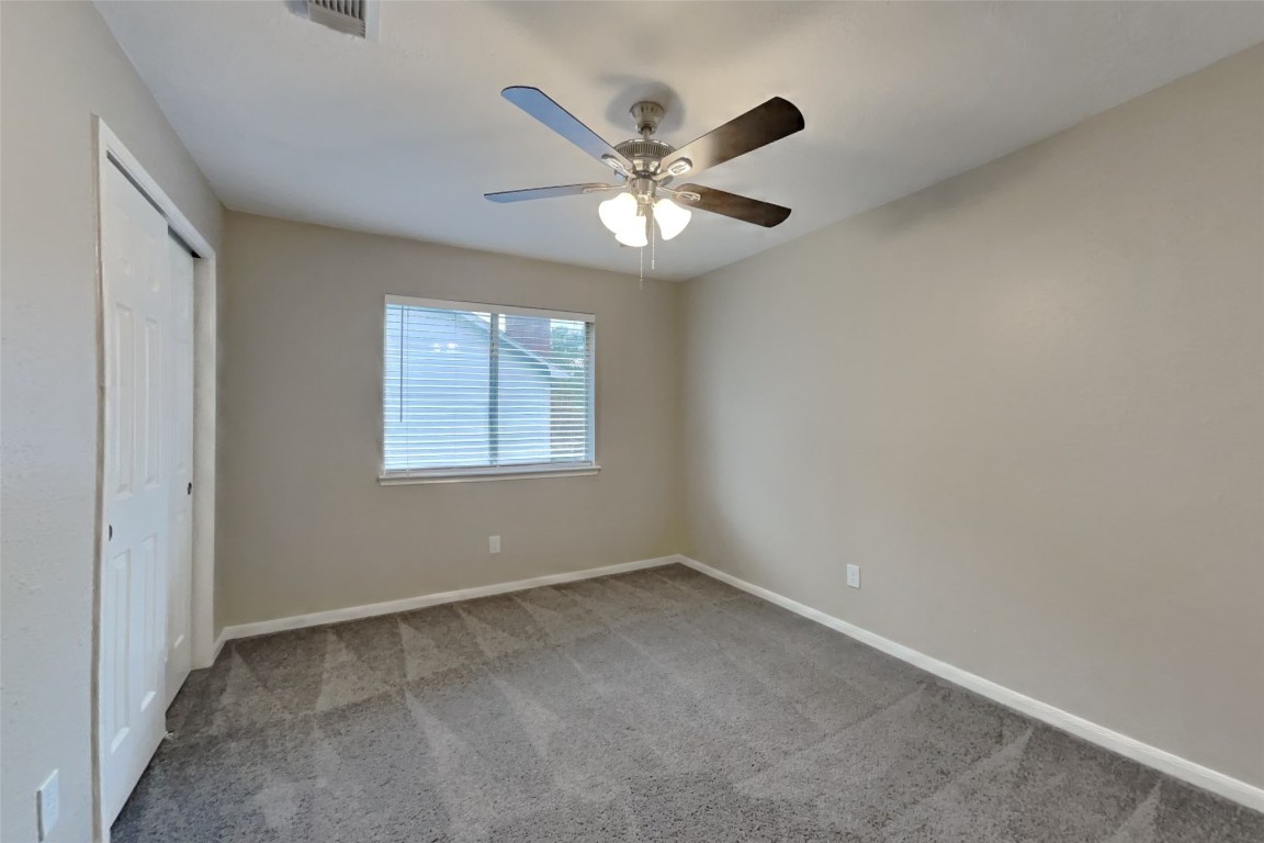 16411 Willingham Way Houston, TX 77095 - Photo 13 of 21 a view of an empty room with a window