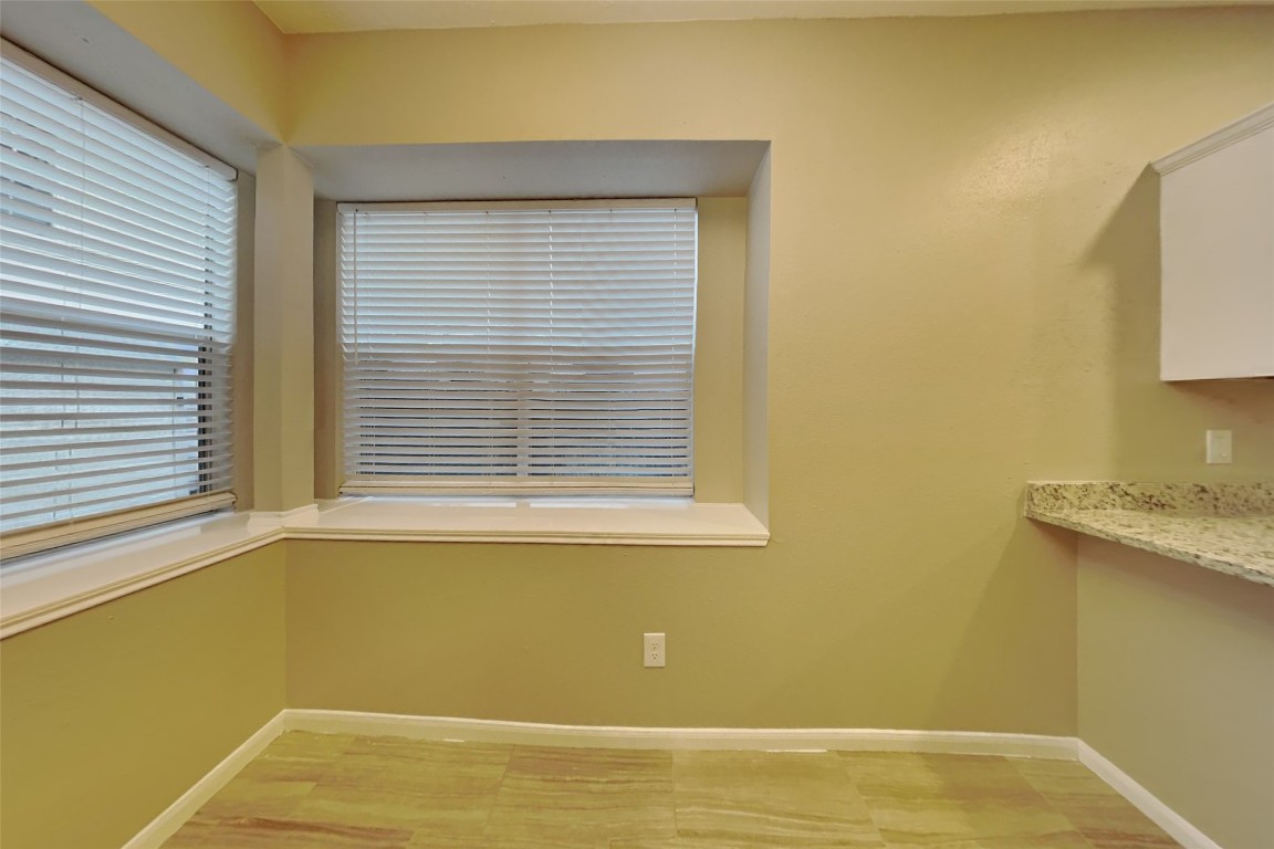 16411 Willingham Way Houston, TX 77095 - Photo 6 of 21 a view of a room that has a window