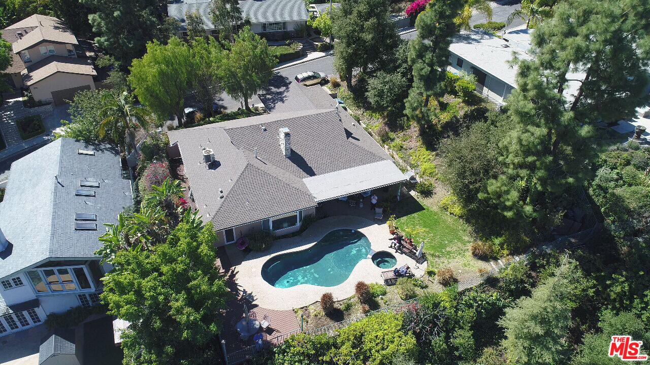 10935 Alta View Drive Studio City, CA 91604 - Photo 2 of 45 an aerial view of a house with a yard and large trees