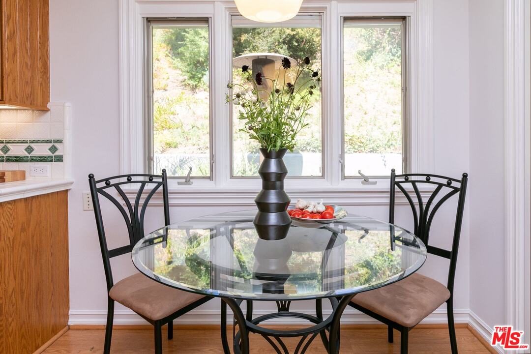 10935 Alta View Drive Studio City, CA 91604 - Photo 14 of 45 a view of a dining room with furniture window and outside view