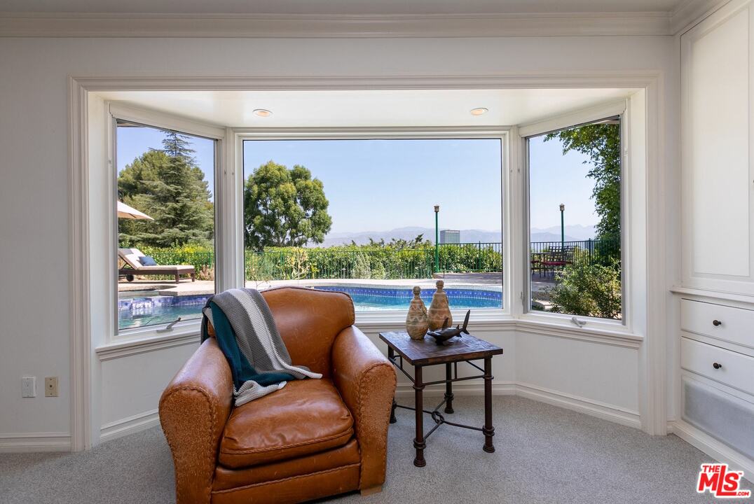10935 Alta View Drive Studio City, CA 91604 - Photo 20 of 45 a outdoor living room with furniture and a window