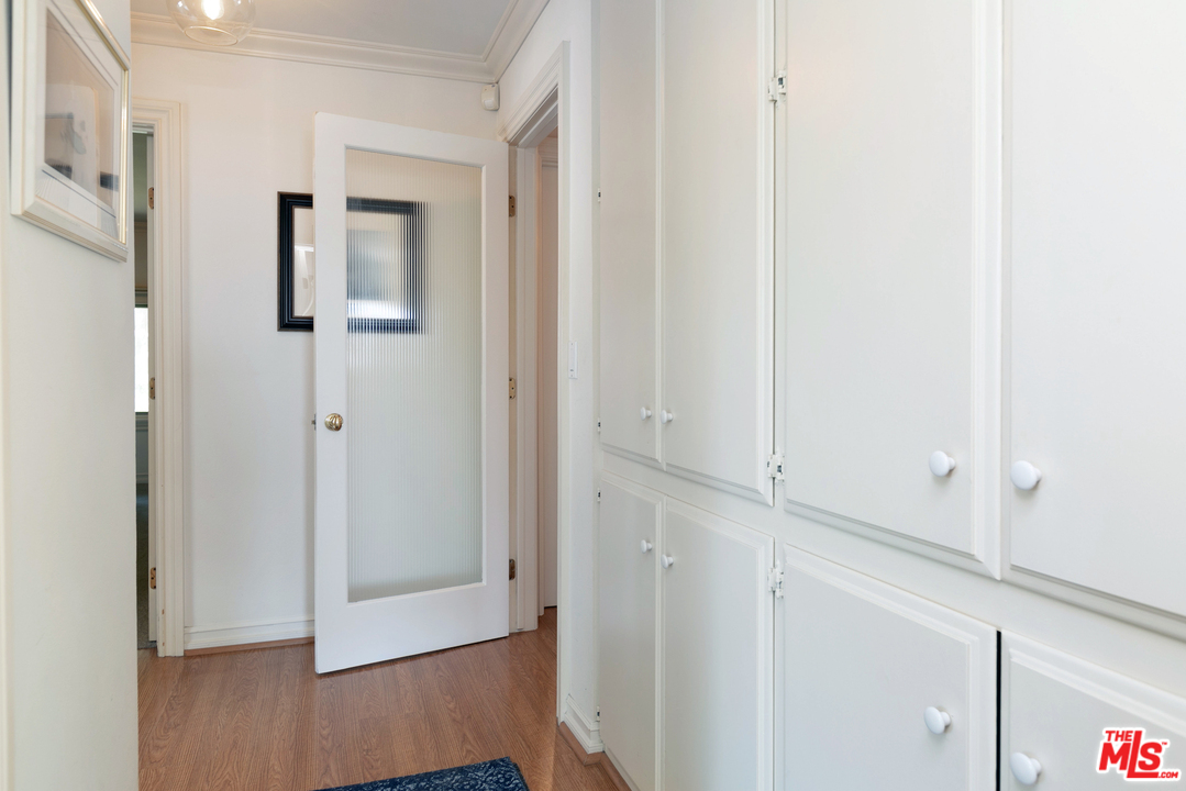 10935 Alta View Drive Studio City, CA 91604 - Photo 24 of 45 a view of a hallway with wooden floor