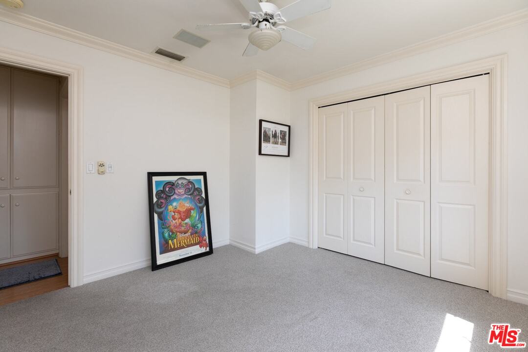 10935 Alta View Drive Studio City, CA 91604 - Photo 26 of 45 a view of an empty room with painting on the wall