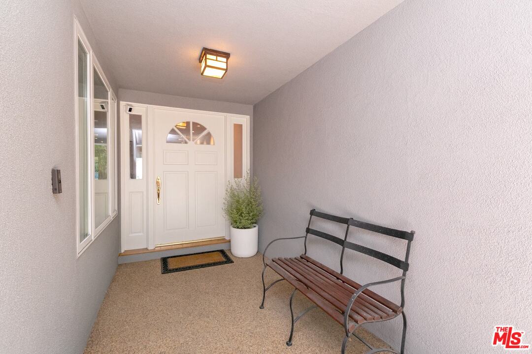 10935 Alta View Drive Studio City, CA 91604 - Photo 4 of 45 a view of a hallway with interior of the house