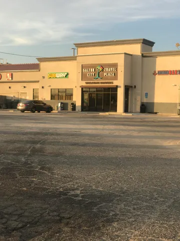 a view of a water heater and a garage