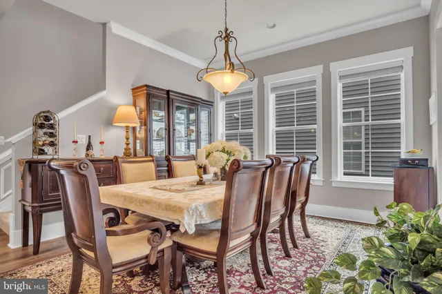 a living room with fireplace furniture and a flat screen tv