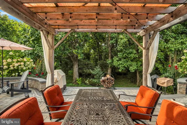 an aerial view of a house with a ocean view