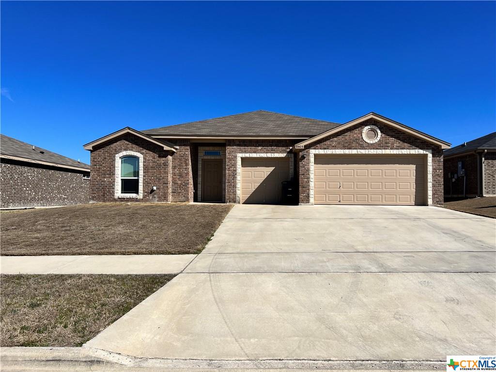 4405 Texas Rangers Drive Killeen, TX 76549 - Photo 1 of 1 a front view of a house with a yard