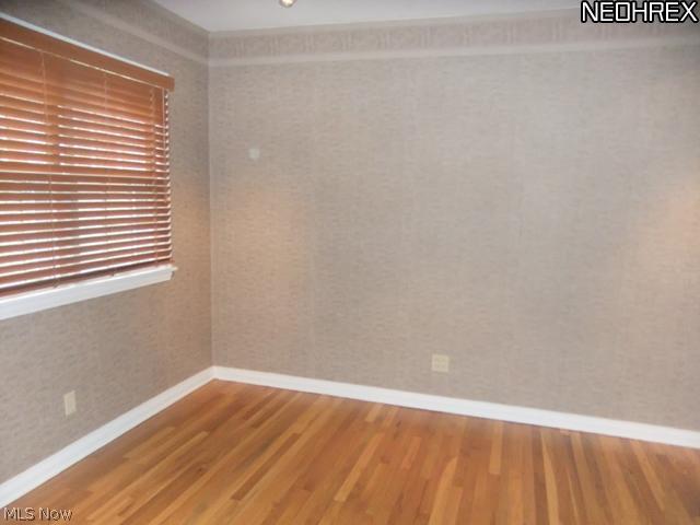 60 Sand Run Road Akron, OH 44313 - Photo 6 of 24 The den features hardwood floors and a great space for your at home office.