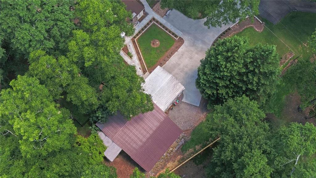 1858 Pinecrest Road Gainesville, GA 30501 - Photo 54 of 55 an aerial view of a house with garden space and street view