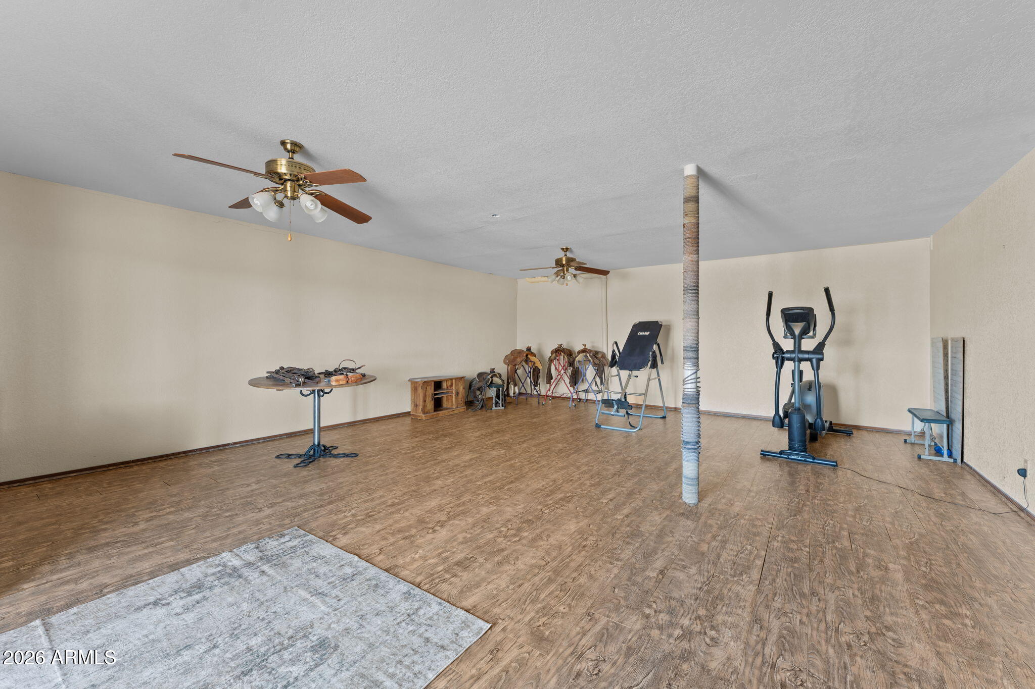 35085 South Turtle Creek Road Wickenburg, AZ 85390 - Photo 28 of 55 a view of a room with gym equipment