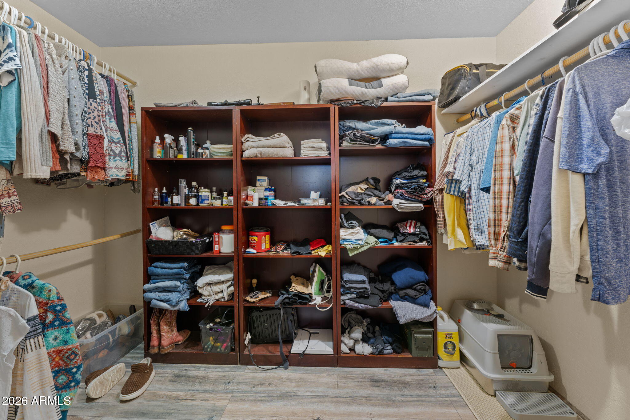 35085 South Turtle Creek Road Wickenburg, AZ 85390 - Photo 36 of 55 a view of walk in closet with clothes and shoes