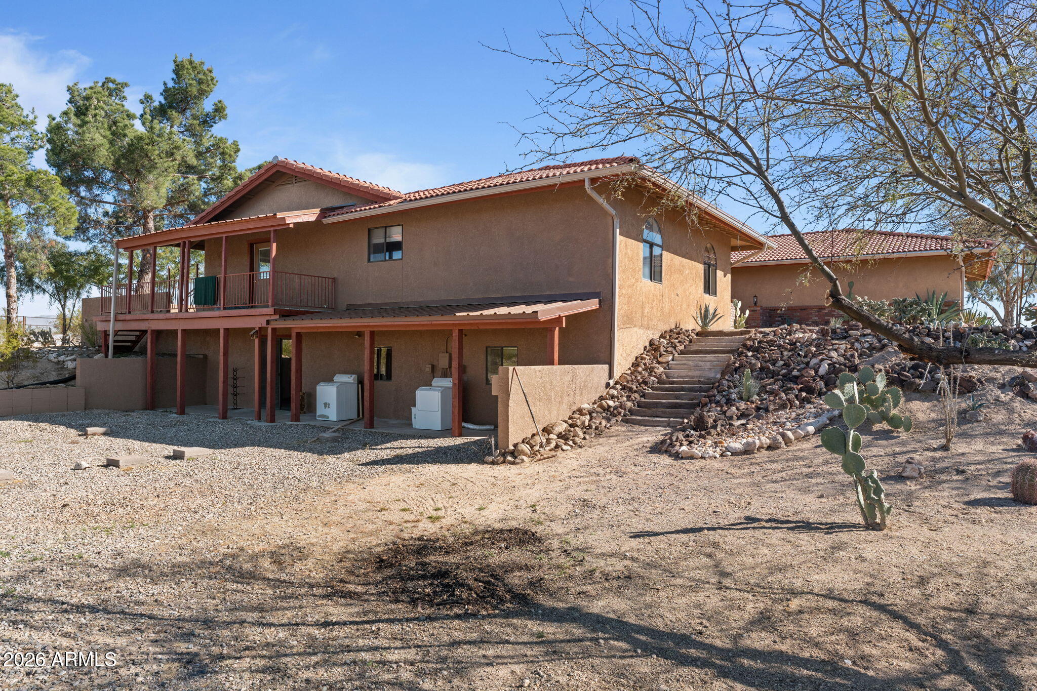 35085 South Turtle Creek Road Wickenburg, AZ 85390 - Photo 54 of 55 a house with trees in the background