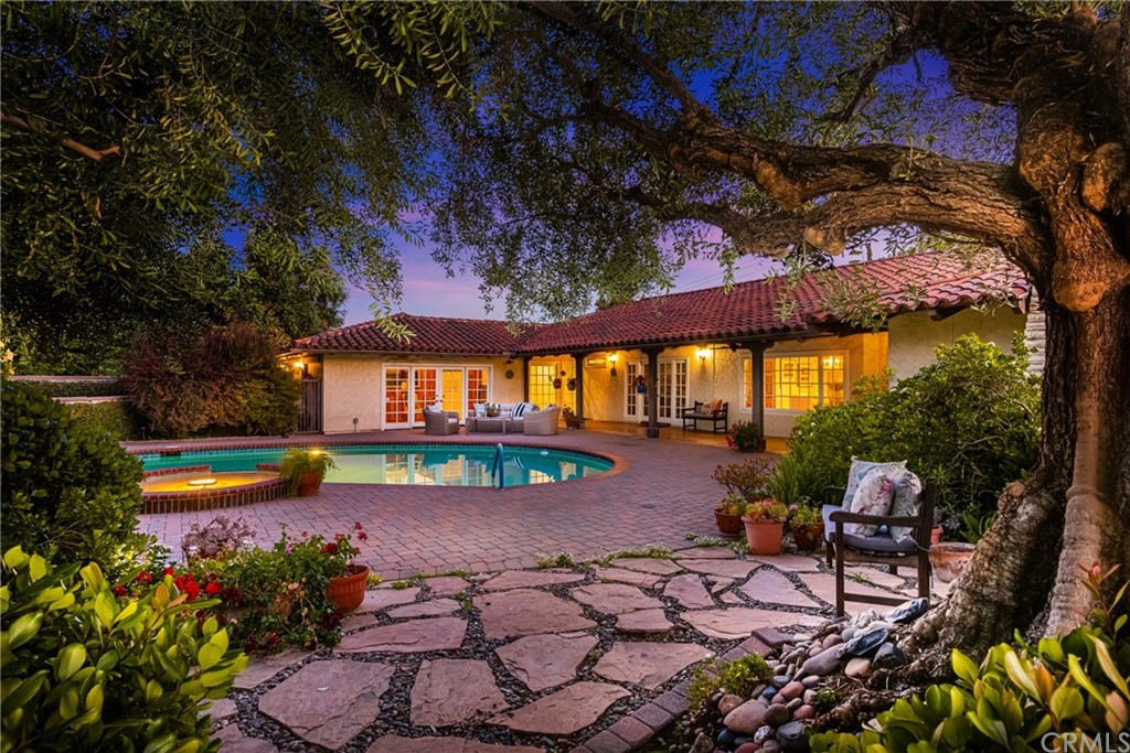 a view of a swimming pool with a patio