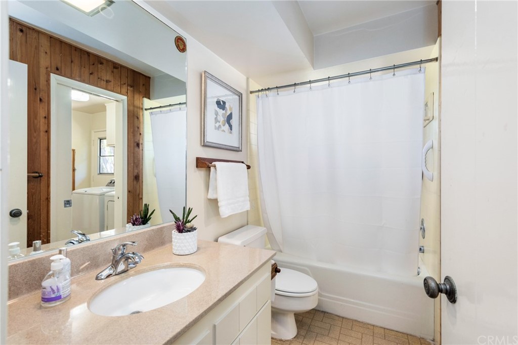 2012 Omega Drive North Tustin, CA 92705 - Photo 29 of 41 a bathroom with a sink toilet and shower