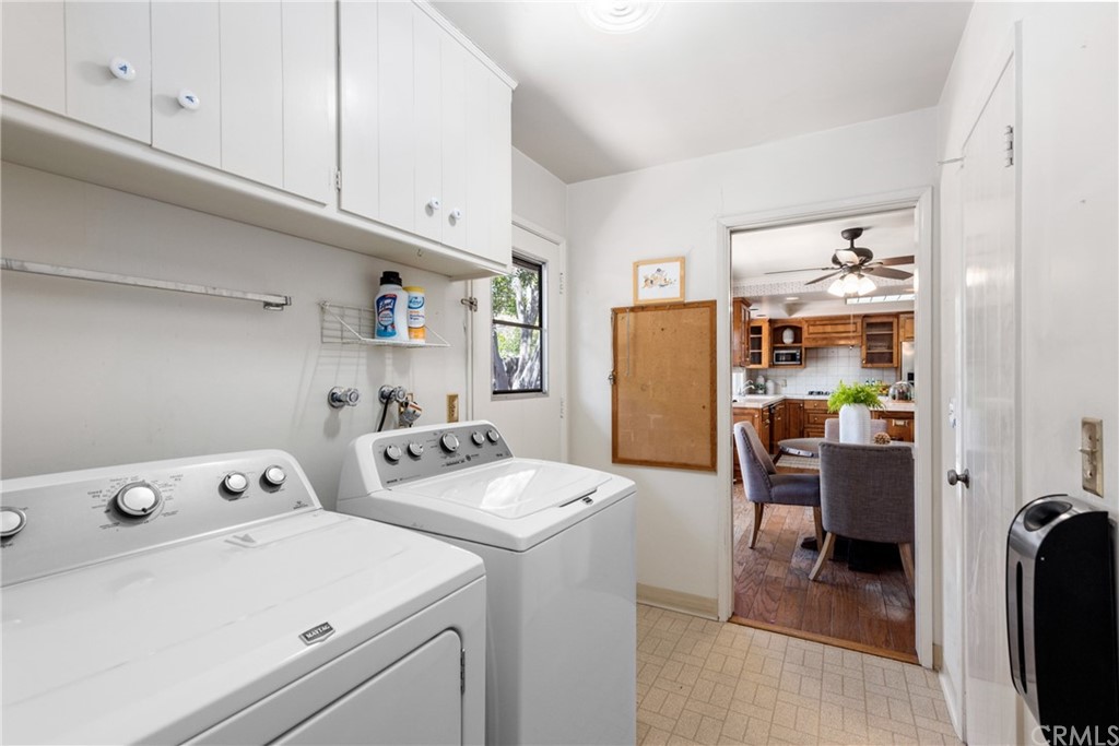 2012 Omega Drive North Tustin, CA 92705 - Photo 30 of 41 a view of washer and dryer with kitchen in the background