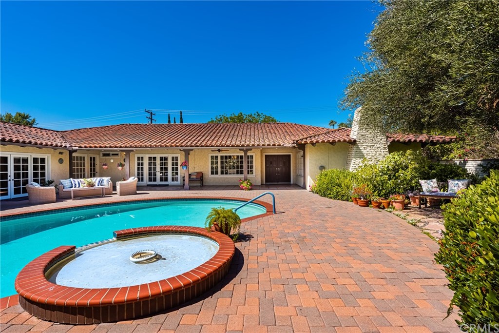 2012 Omega Drive North Tustin, CA 92705 - Photo 9 of 41 a view of a house with swimming pool and a yard