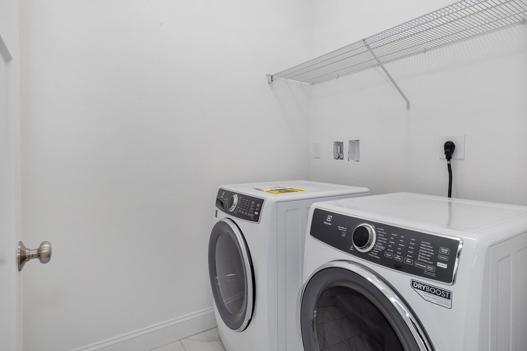 8 Weber Farm Road, Unit 8 Wrentham, MA 02093 - Photo 26 of 35 a utility room with dryer and washer