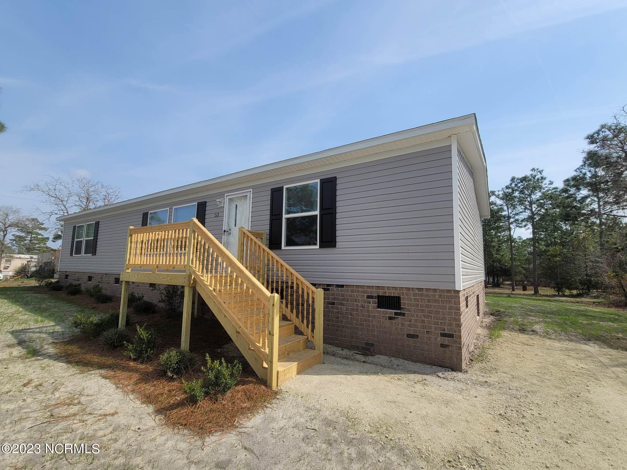 53 Little Pond Road Rocky Point, NC 28457 - Photo 3 of 27 Driveway to Porch