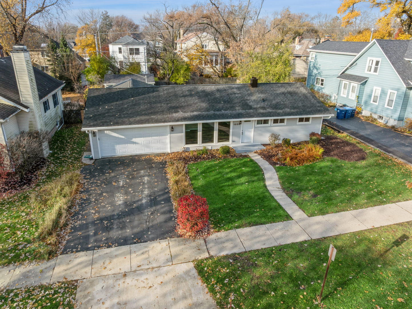 1030 Chestnut Street Deerfield, IL 60015 - Photo 3 of 11 a front view of a house with a yard