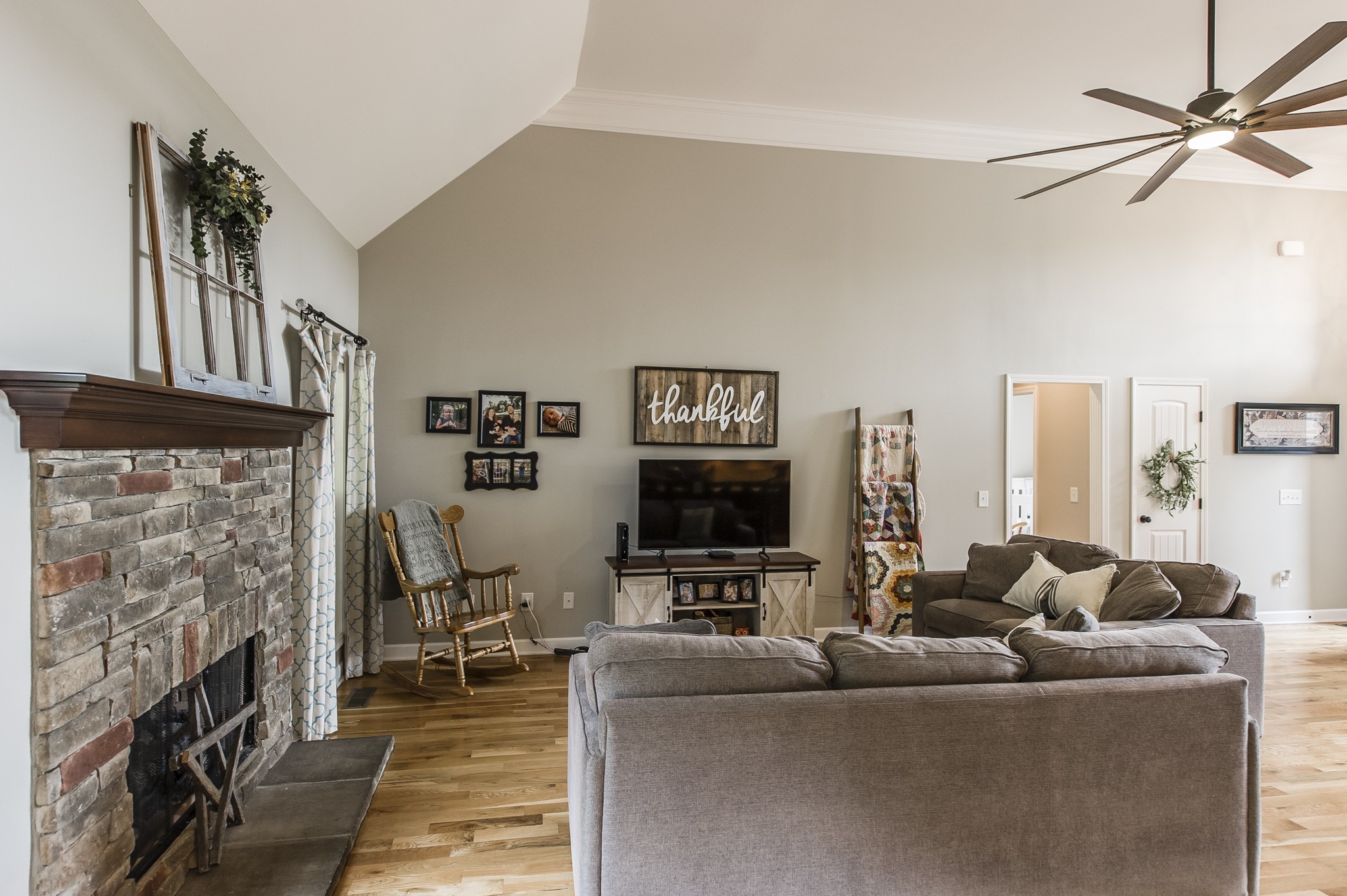 1145 Kimberly Drive Goodlettsville, TN 37072 - Photo 13 of 70 a living room with furniture a fireplace and a flat screen tv