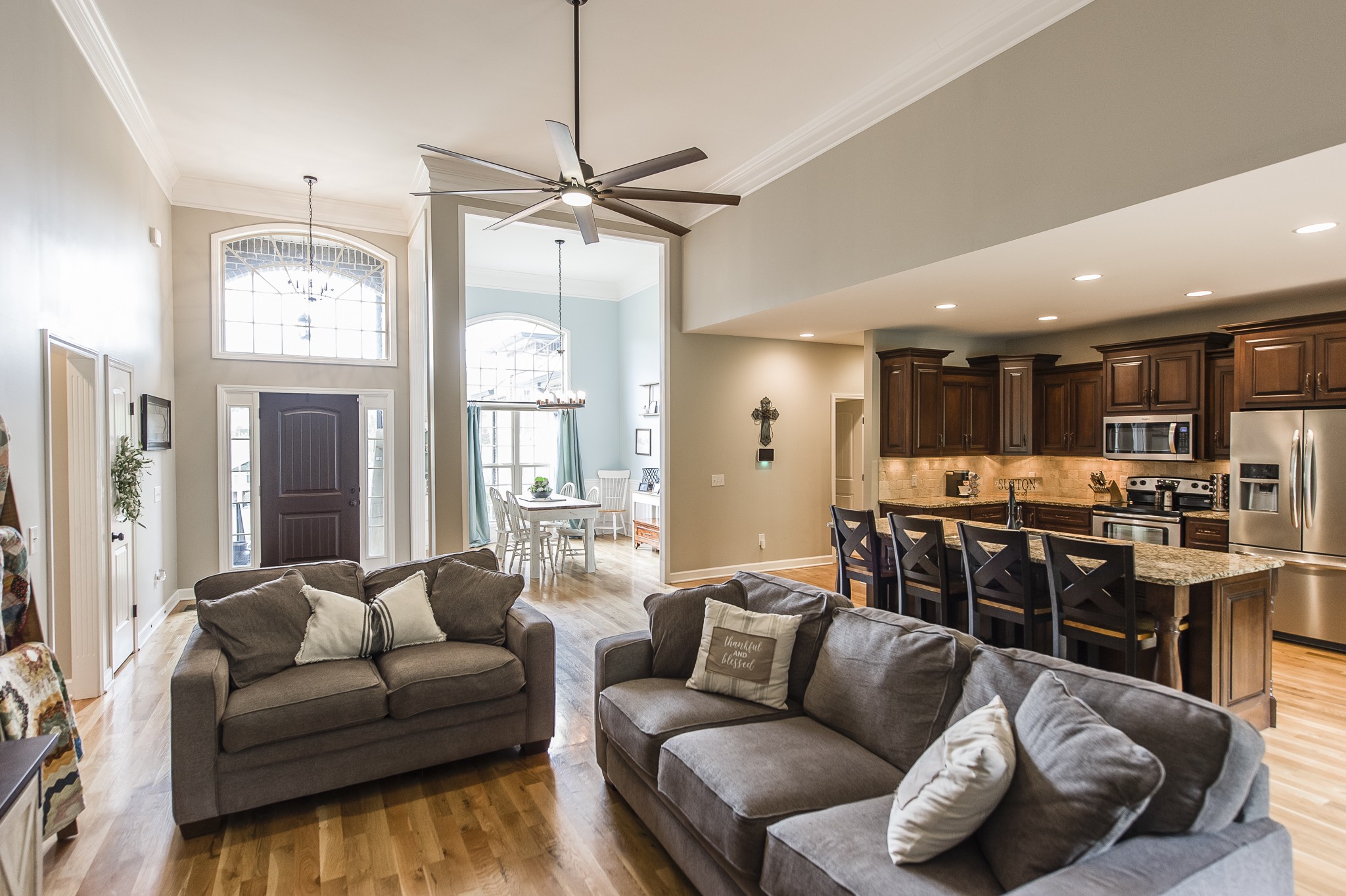 1145 Kimberly Drive Goodlettsville, TN 37072 - Photo 15 of 70 a living room with furniture kitchen area and a chandelier
