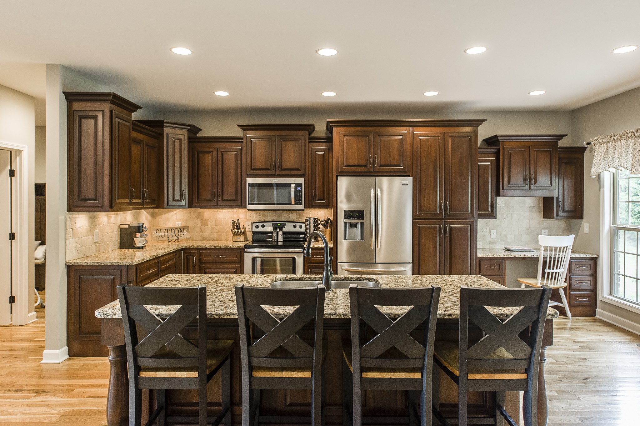 1145 Kimberly Drive Goodlettsville, TN 37072 - Photo 22 of 70 a kitchen with stainless steel appliances kitchen island granite countertop a dining table chairs and granite counter tops
