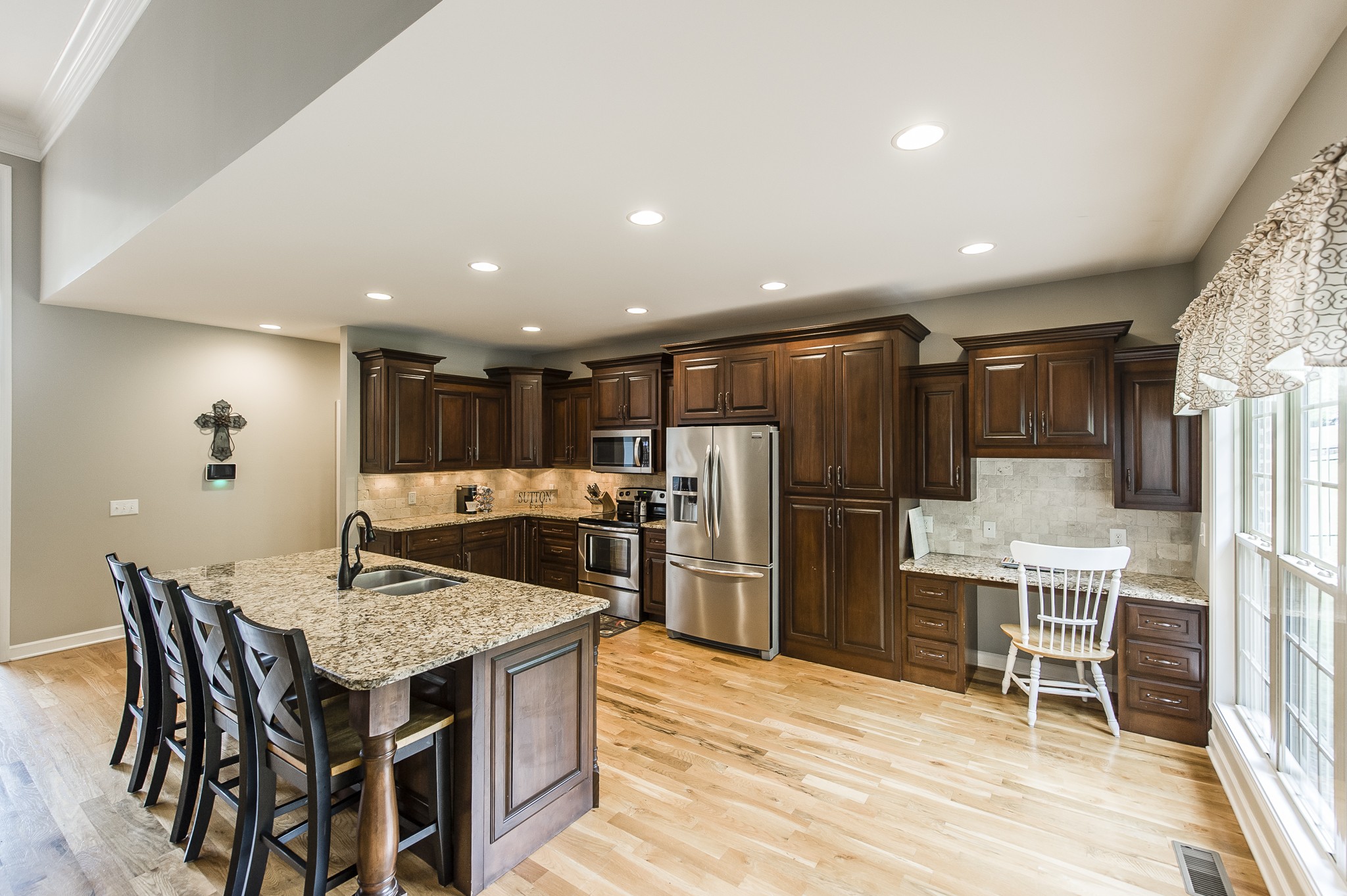 1145 Kimberly Drive Goodlettsville, TN 37072 - Photo 23 of 70 a kitchen with a table and refrigerator