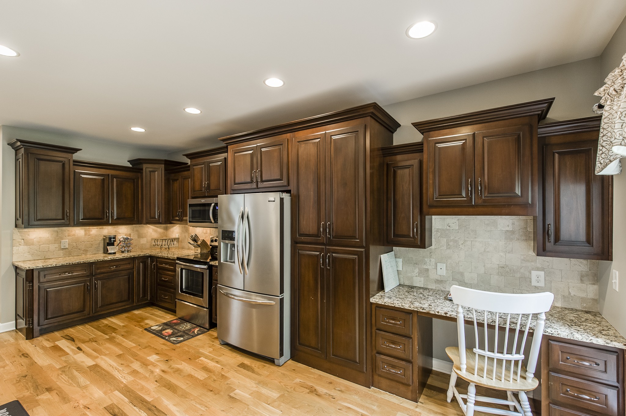 1145 Kimberly Drive Goodlettsville, TN 37072 - Photo 24 of 70 a kitchen with stainless steel appliances granite countertop a refrigerator a sink and a stove