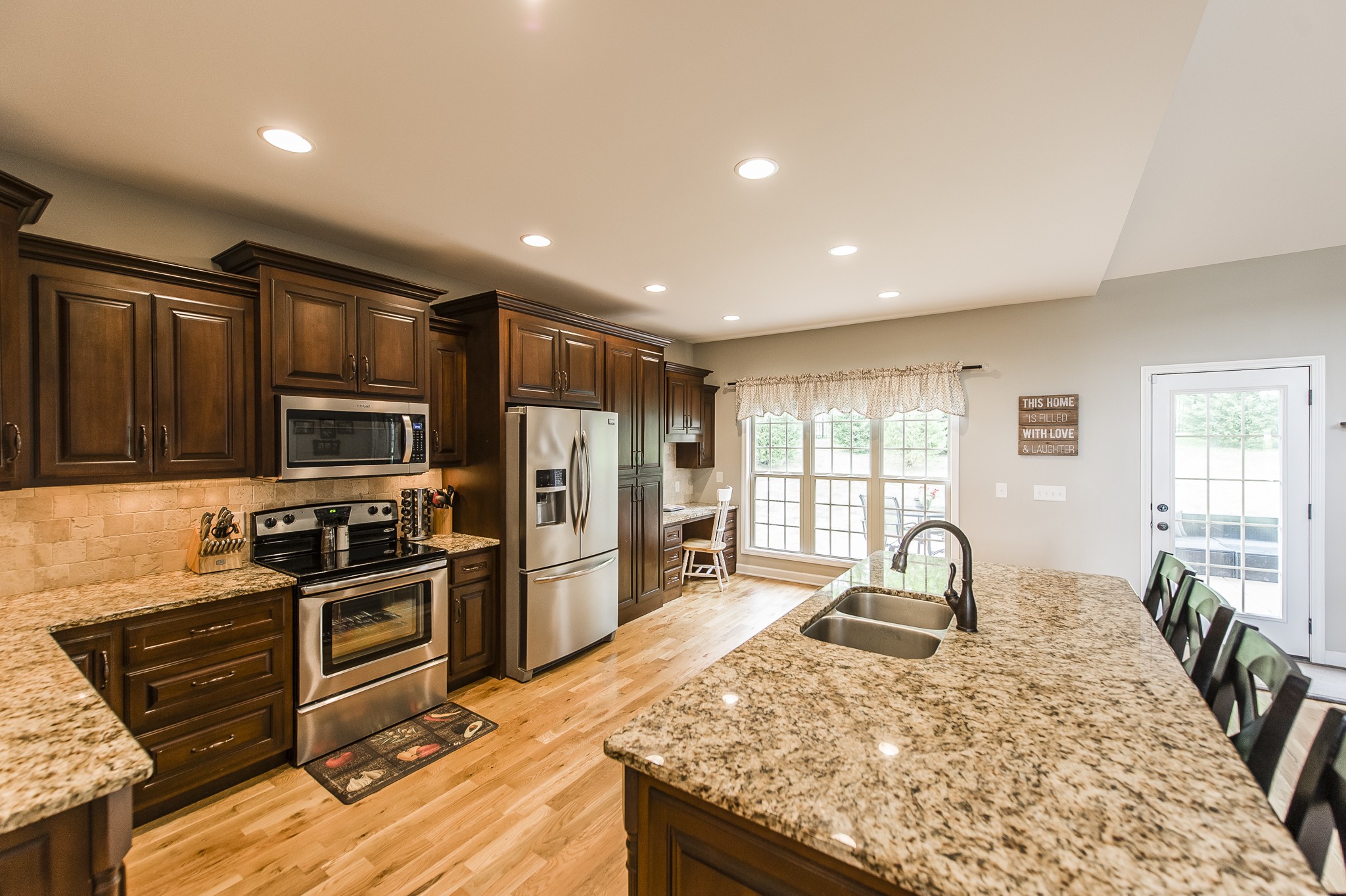 1145 Kimberly Drive Goodlettsville, TN 37072 - Photo 30 of 70 a kitchen with stainless steel appliances granite countertop a sink stove and refrigerator