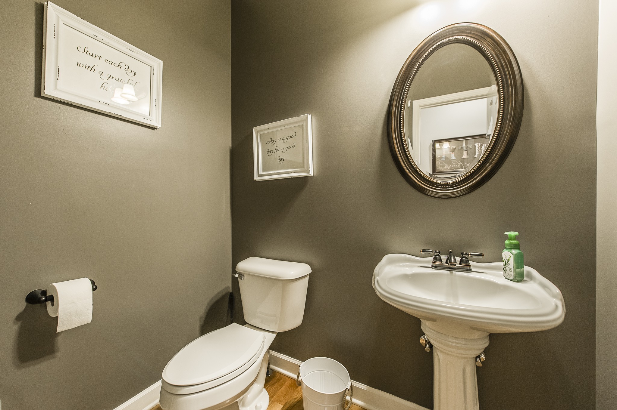1145 Kimberly Drive Goodlettsville, TN 37072 - Photo 31 of 70 a bathroom with a toilet a sink and a mirror