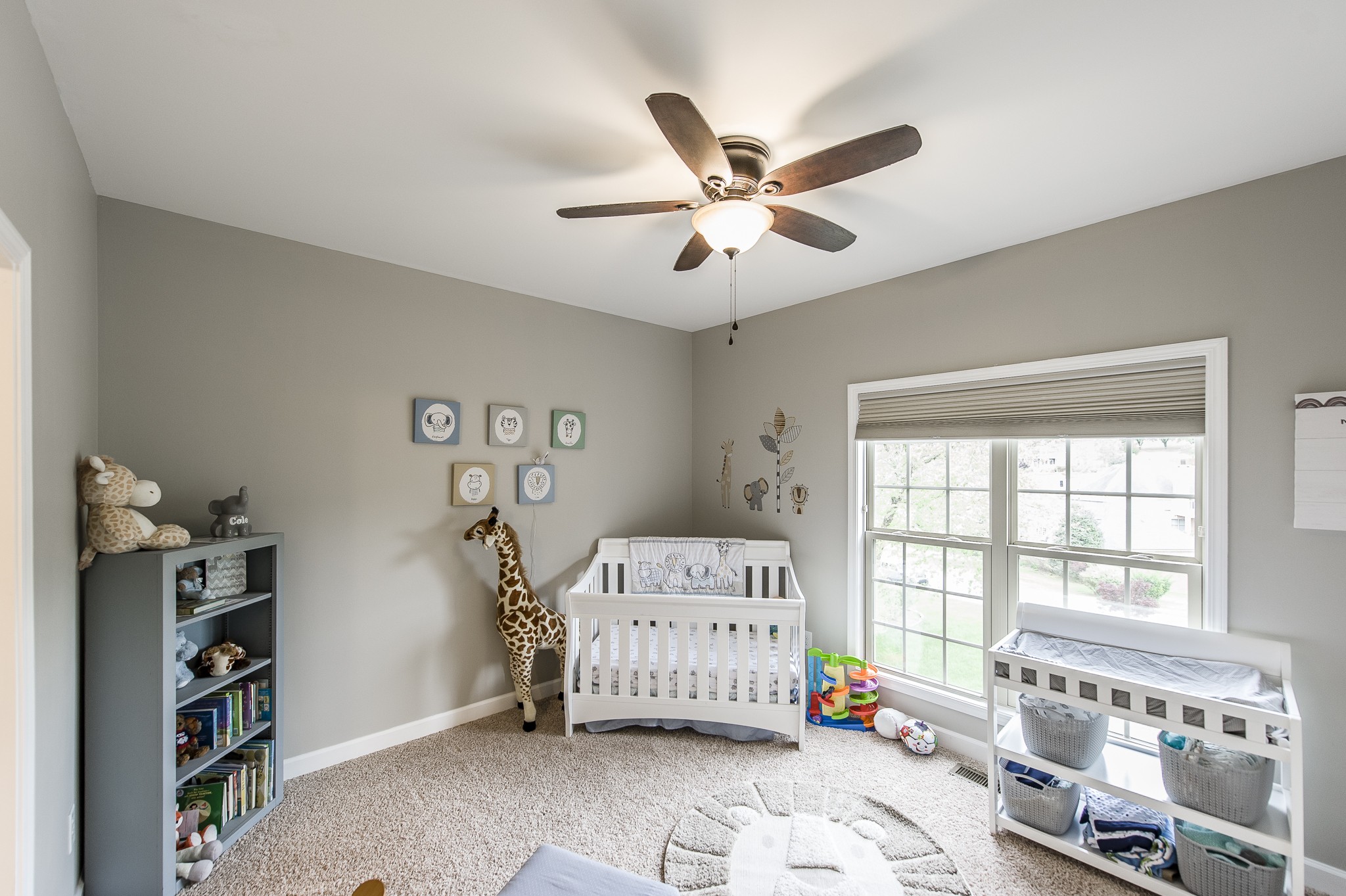 1145 Kimberly Drive Goodlettsville, TN 37072 - Photo 32 of 70 a bedroom with a bed and a large window
