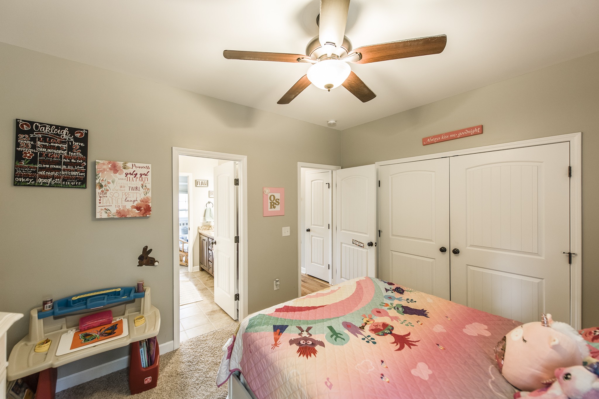 1145 Kimberly Drive Goodlettsville, TN 37072 - Photo 38 of 70 a bedroom with a bed and a chandelier