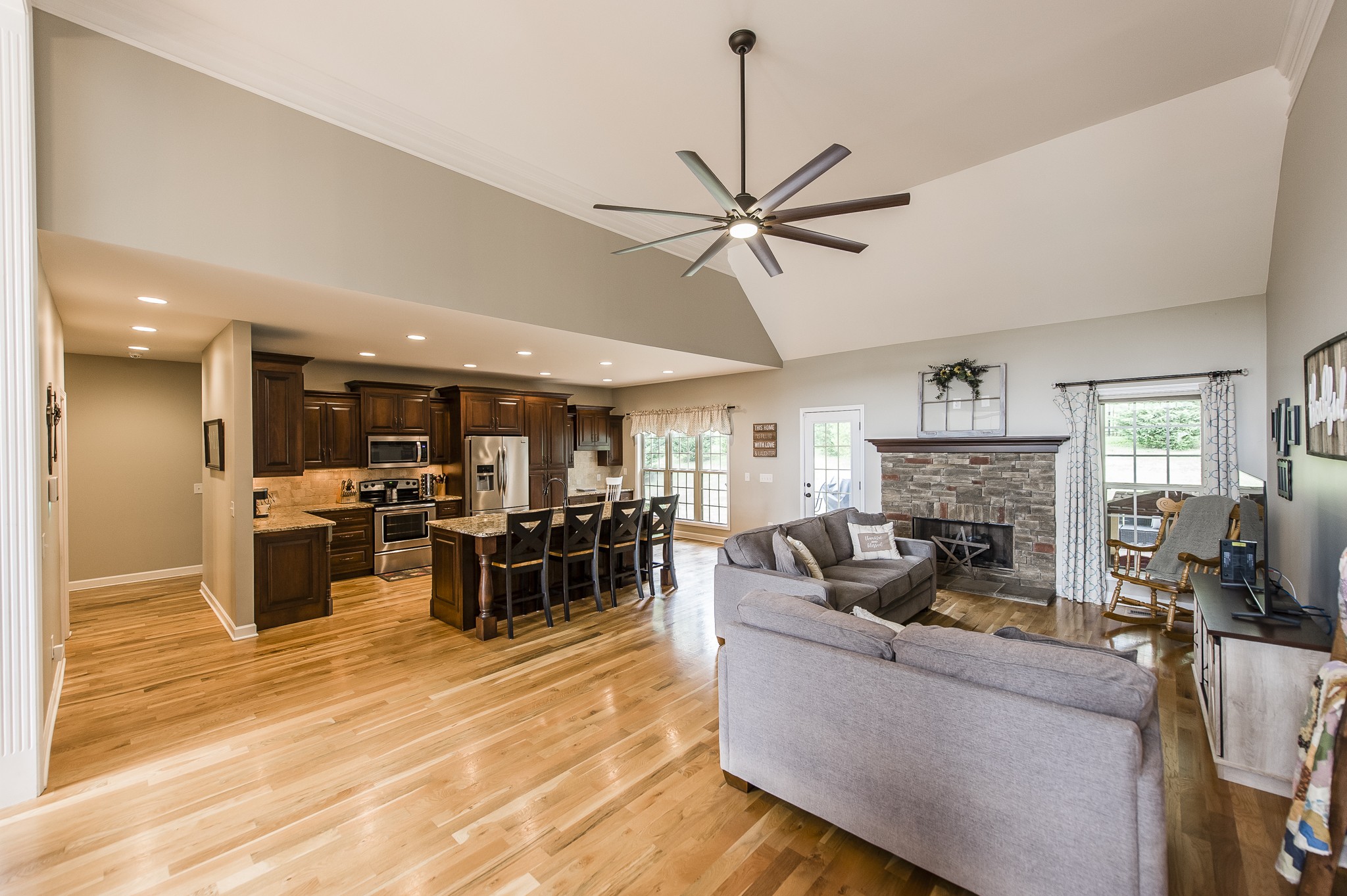 1145 Kimberly Drive Goodlettsville, TN 37072 - Photo 9 of 70 a living room with furniture a fireplace and a flat screen tv