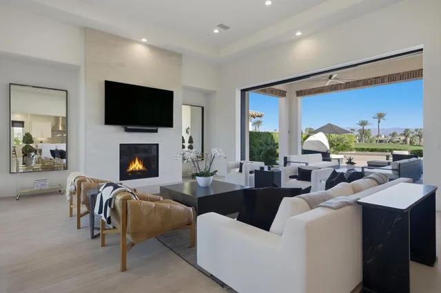 a kitchen with a stove a sink and a refrigerator