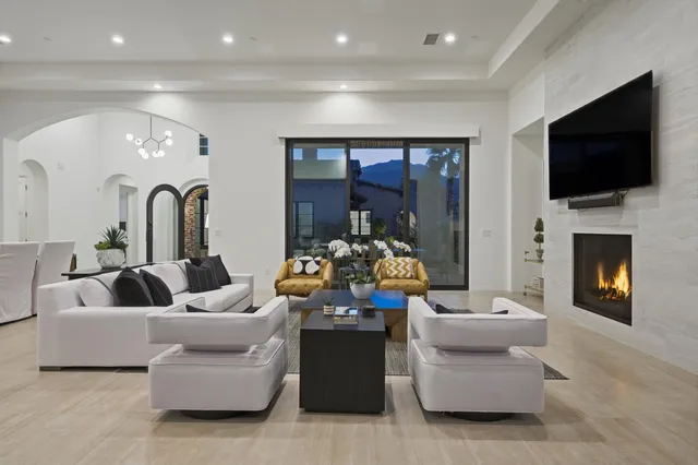 a bathroom with a sink a mirror and a vanity