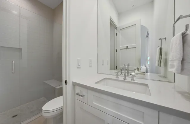 a view of a swimming pool and lounge chairs