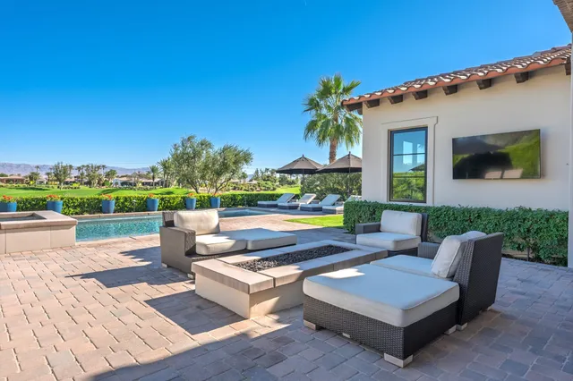 a outdoor living space with furniture and city view