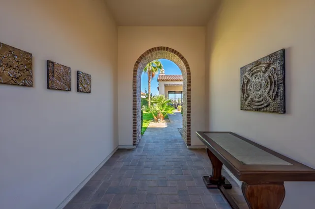 a living room with fireplace furniture and a flat screen tv