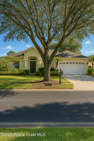 a view of a house with a big yard