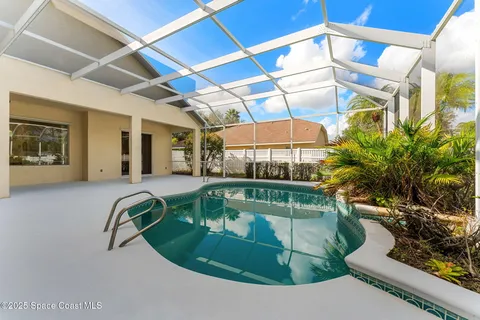 a view of a house with a swimming pool